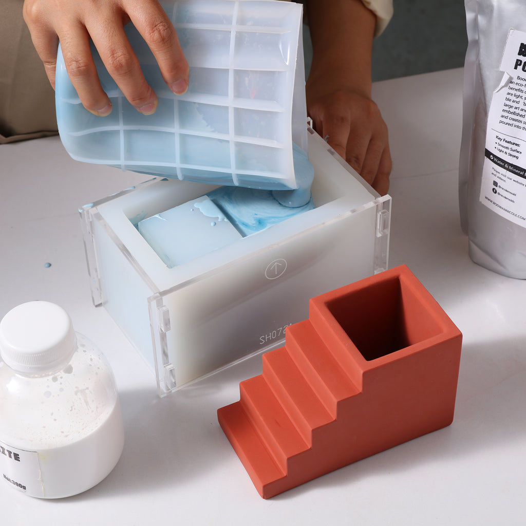Pour boowannite material into silicone mold to make Stairway Pen Holder -Boowan Nicole