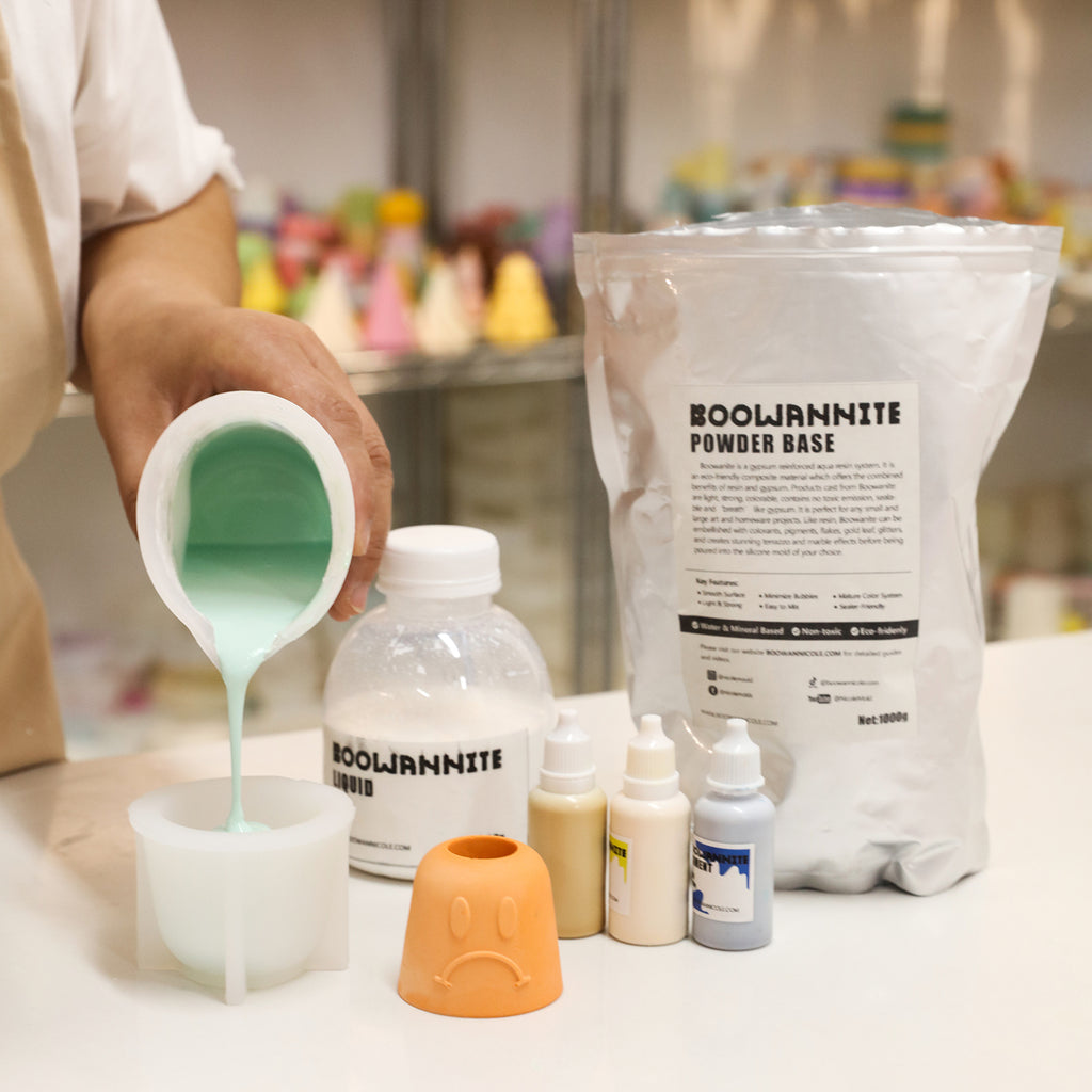 Pour boowannite material into silicone mold to make Pen & Toothbrush Holder-Boowan Nicole