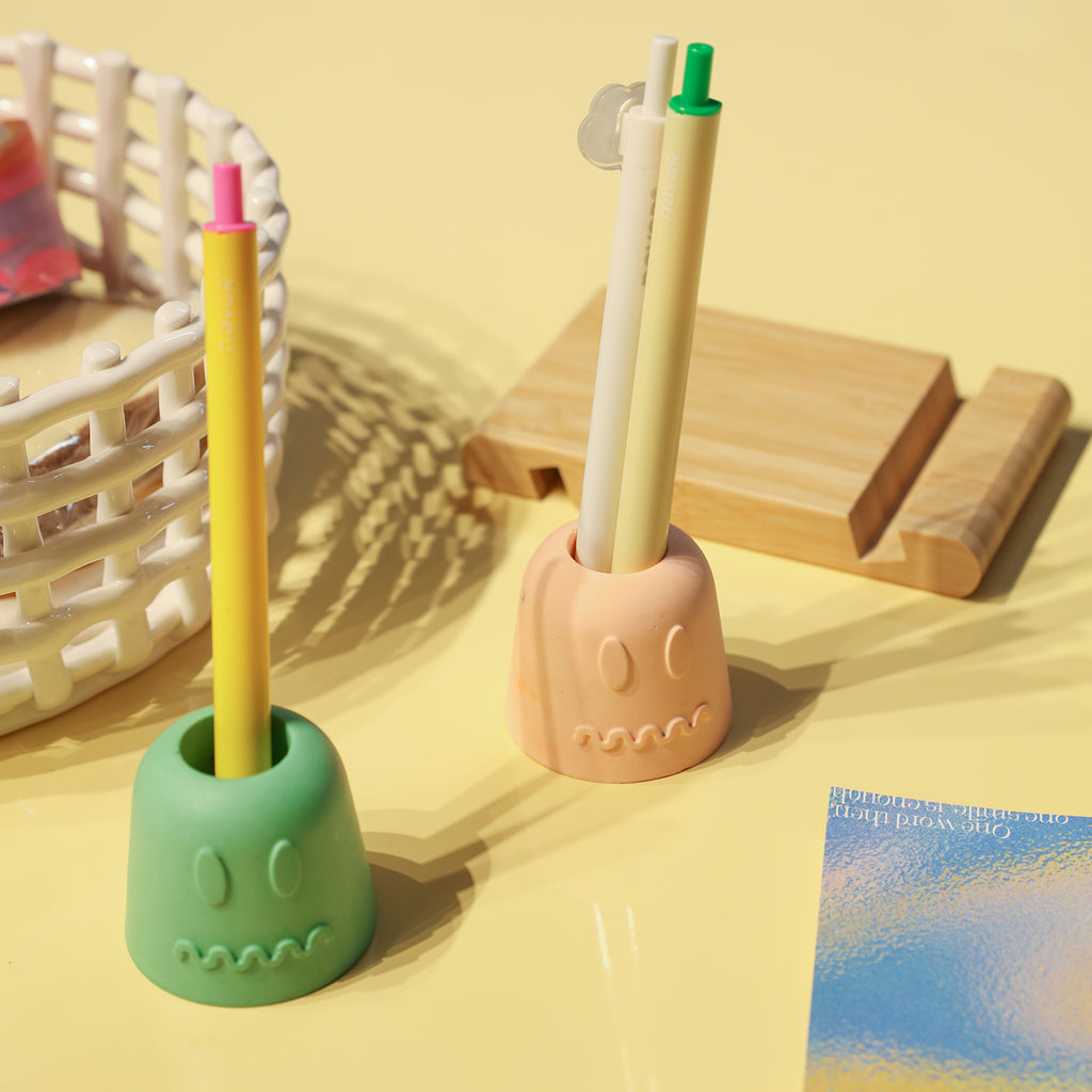 Green and pink Pen & Toothbrush Holder with pen and pencil inserted respectively-Boowan Nicole
