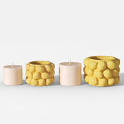 Yellow and white Lemon Drops candle jars with pillar candles on plain white background - Boowan Nicole