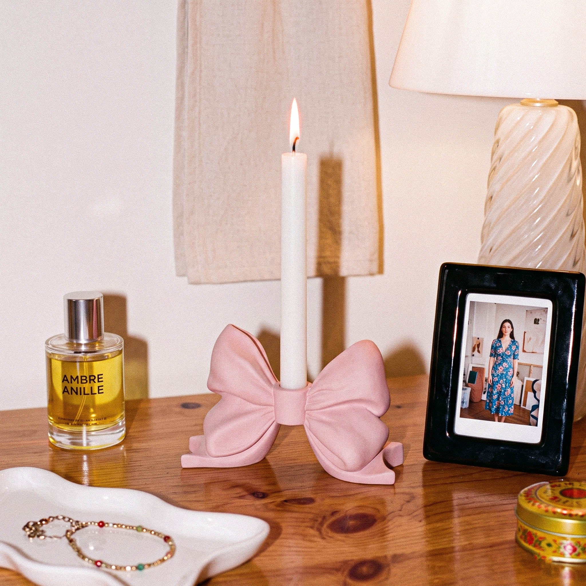 Pink Bow Taper Candle Holder on wooden table, cozy home interior decor - Boowan Nicole