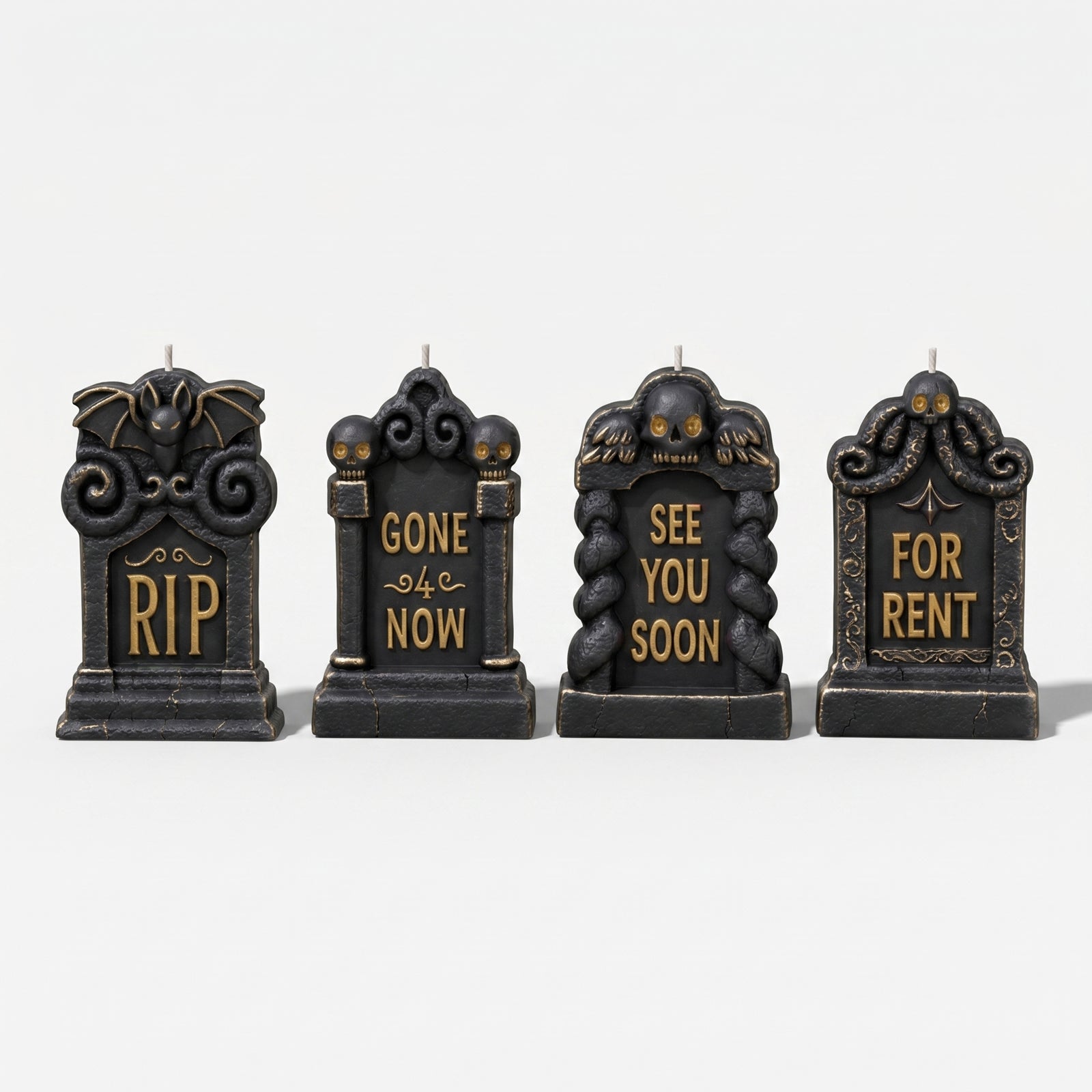 Four styles black gold tombstone pillar candles with spooky Halloween lettering plain white background product shot - Boowan Nicole