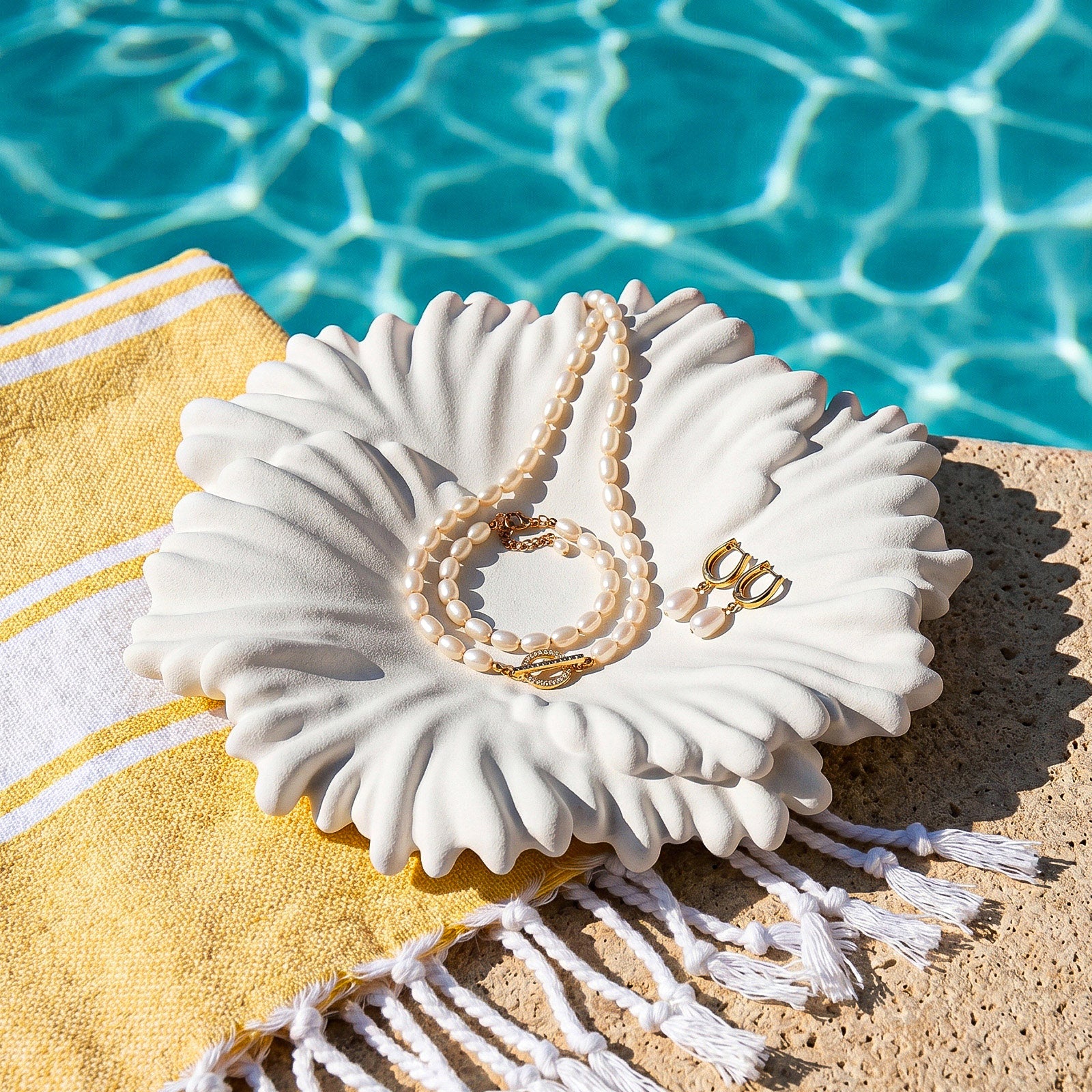 Ocean Wave Serenity Tray with pearl jewelry and beach towel by the pool - Boowan Nicole