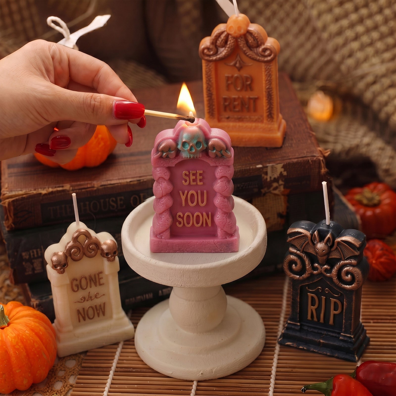 Multi-color tombstone candles display, hand lighting pink "SEE YOU SOON" tombstone candle fall Halloween table styling - Boowan Nicole