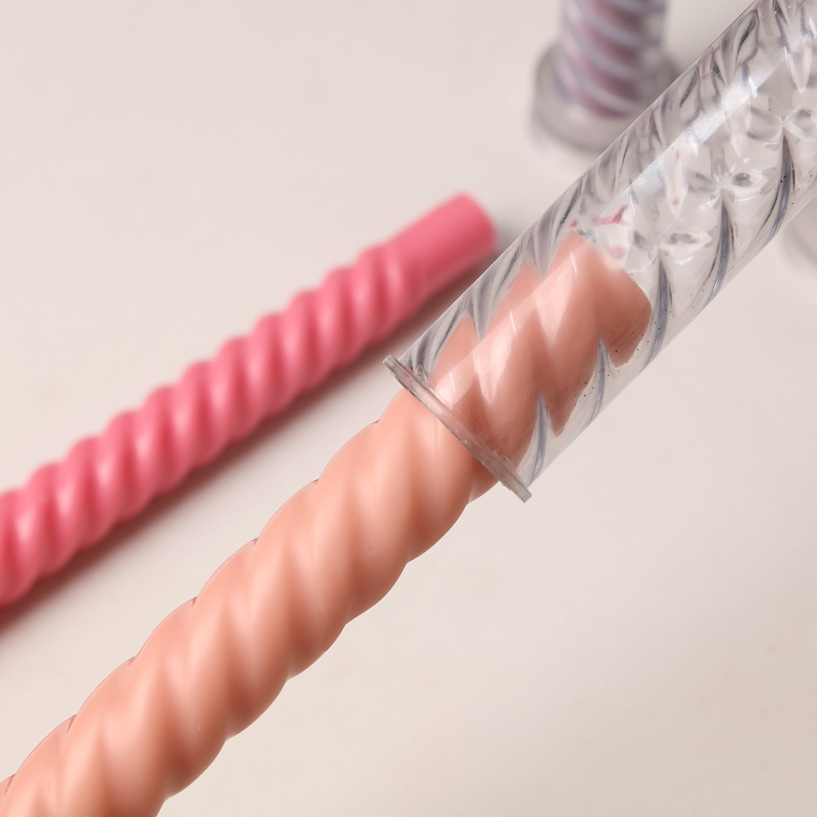 Unmolding Finished Nude Twist Taper Candle from Clear Acrylic Mold - Boowan Nicole