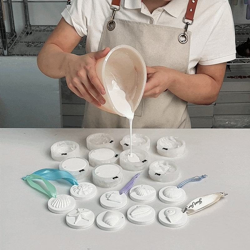 Pouring Plaster into La Isla Bonita Seashell & Starfish Scent Hanger Silicone Mold - Crafting Process Step - Boowan Nicole