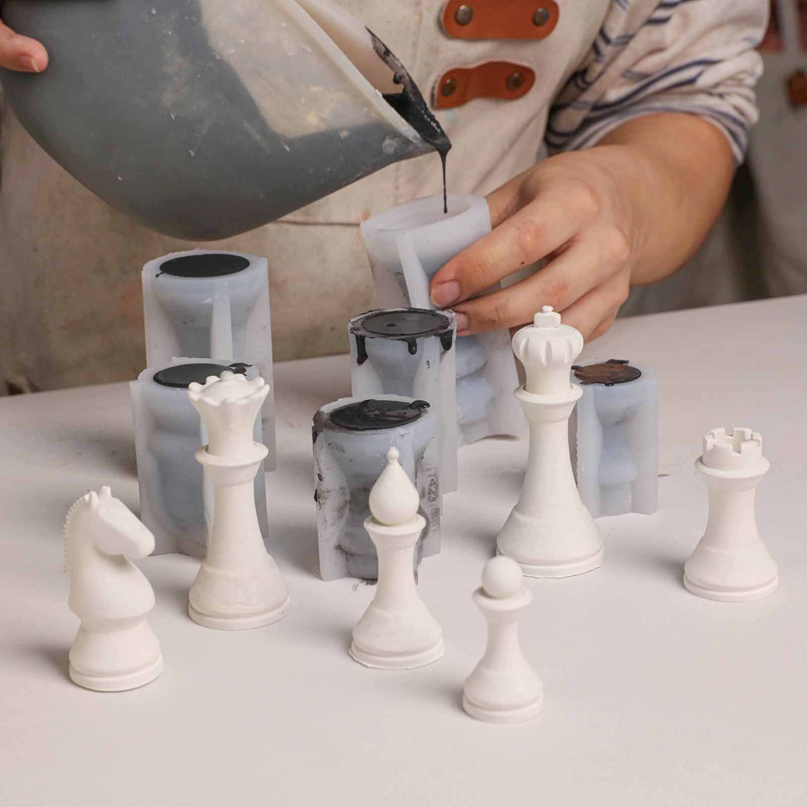 Pouring Material into Chess Piece Silicone Molds - Boowan Nicole