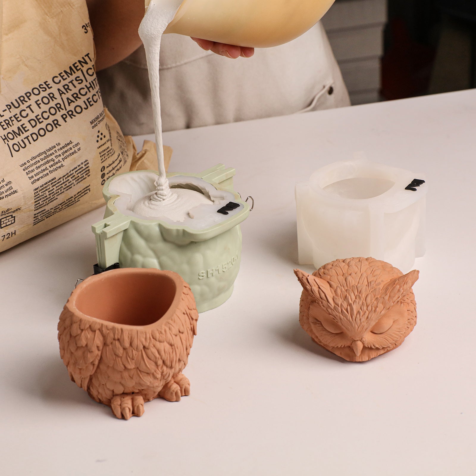 DIY casting process, pouring cement material into owl candle jar silicone mold set - Boowan Nicole