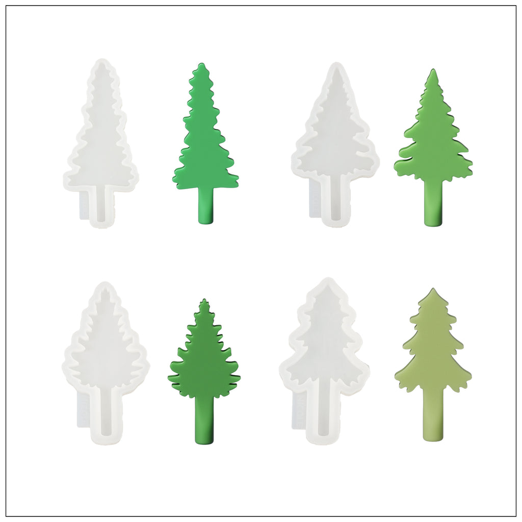 Four Christmas tree-shaped candles of different lengths and shapes and corresponding silicone molds.