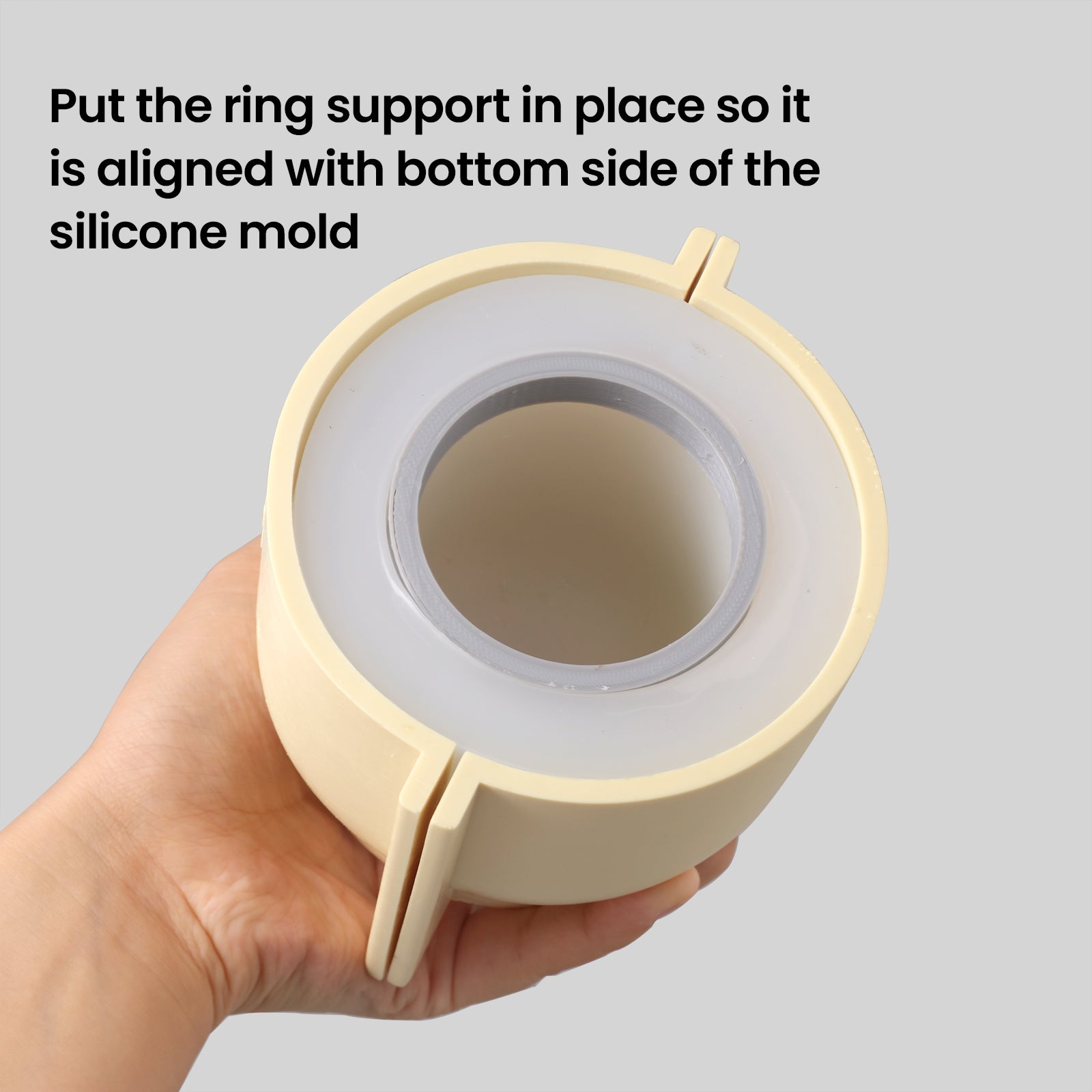 The white silicone mold used to make the Chalice Tall Candle Jar has a support ring placed in it to prevent deformation - Boowan Nicole