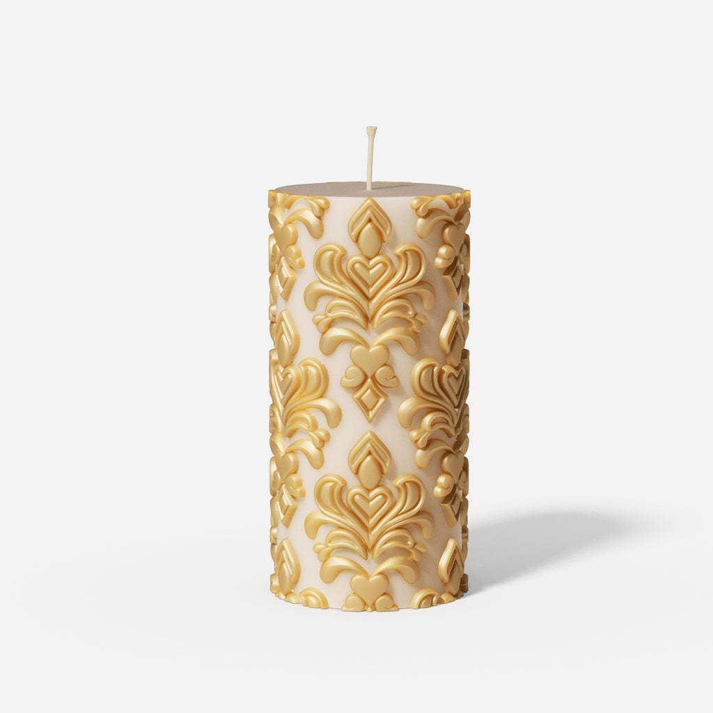 Elegant tall white relief patterned pillar candle with gold accents.
