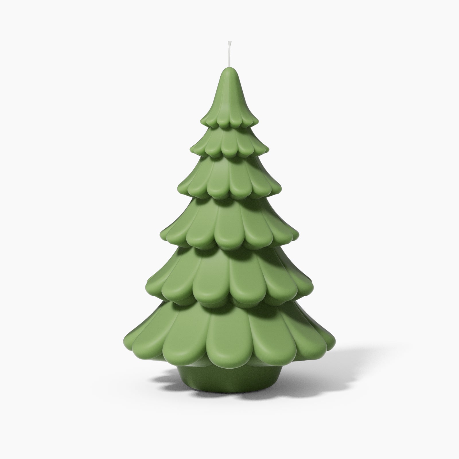 8.5" green layered Christmas tree candle by Boowan Nicole.