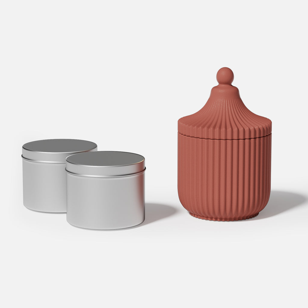 A ridged candle jar made from boowannicole molds and two aluminum jars for refill candles, with a clear design and minimalist aesthetic.