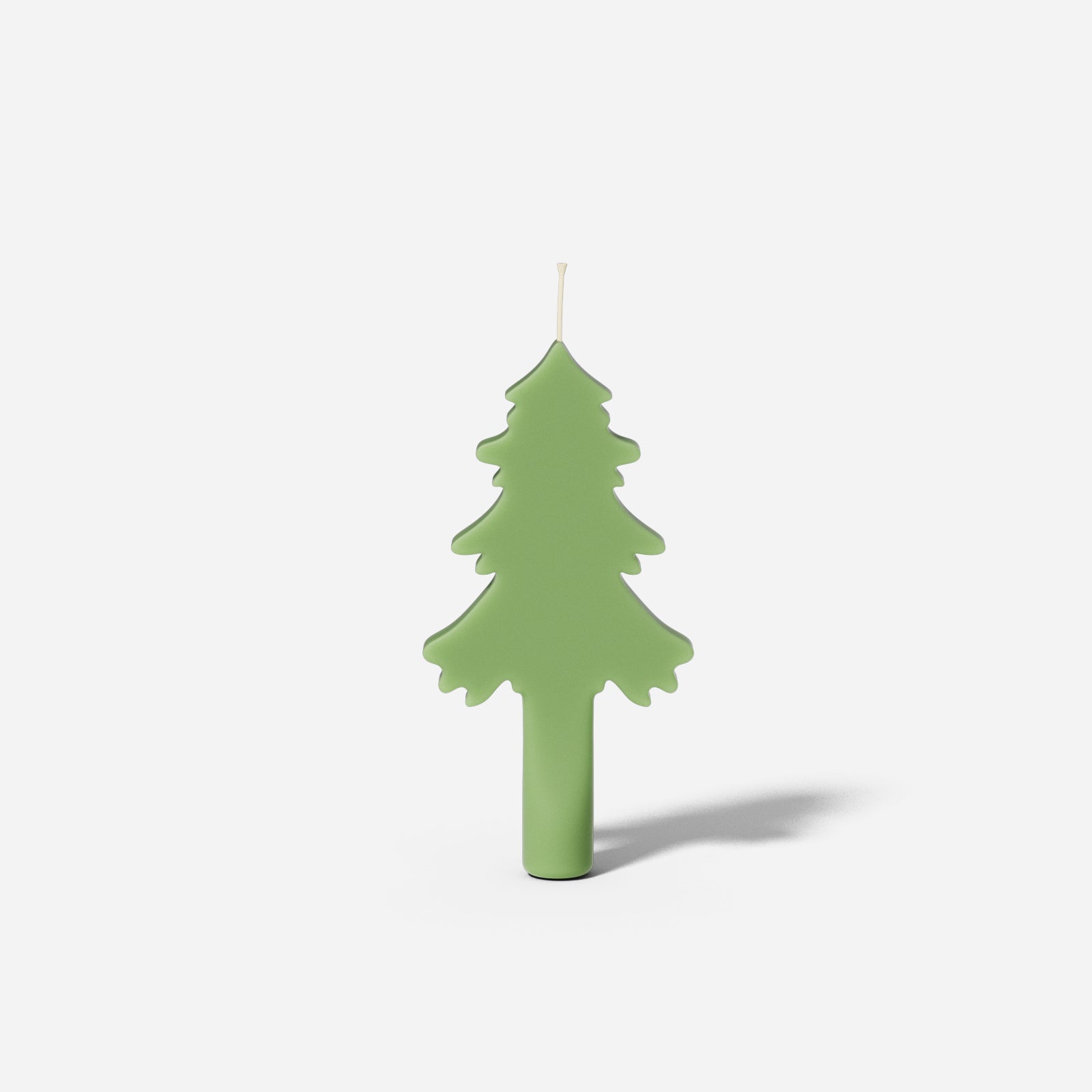 Candles made from silicone molds for Christmas tree-shaped tapered candles launched by Boowan Nicole.