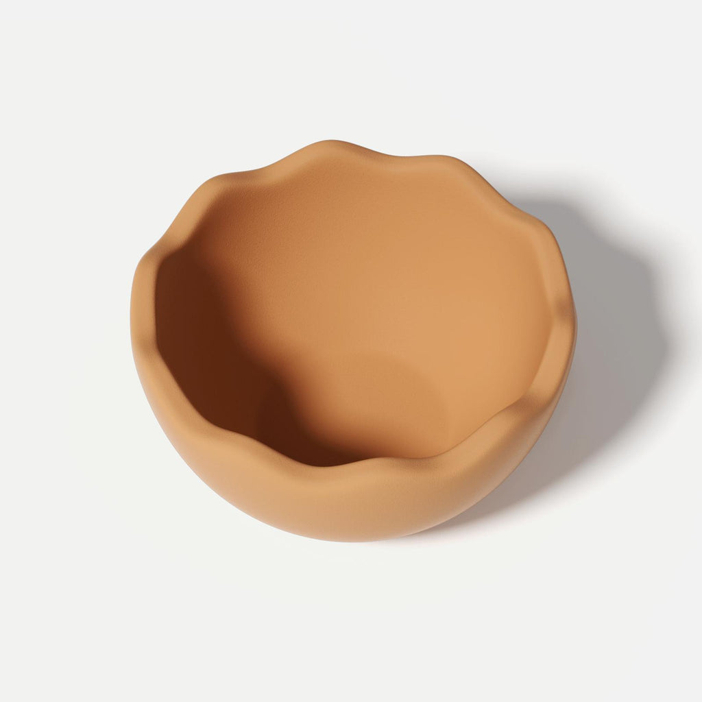 Orange eggshell bowl made from silicone mold