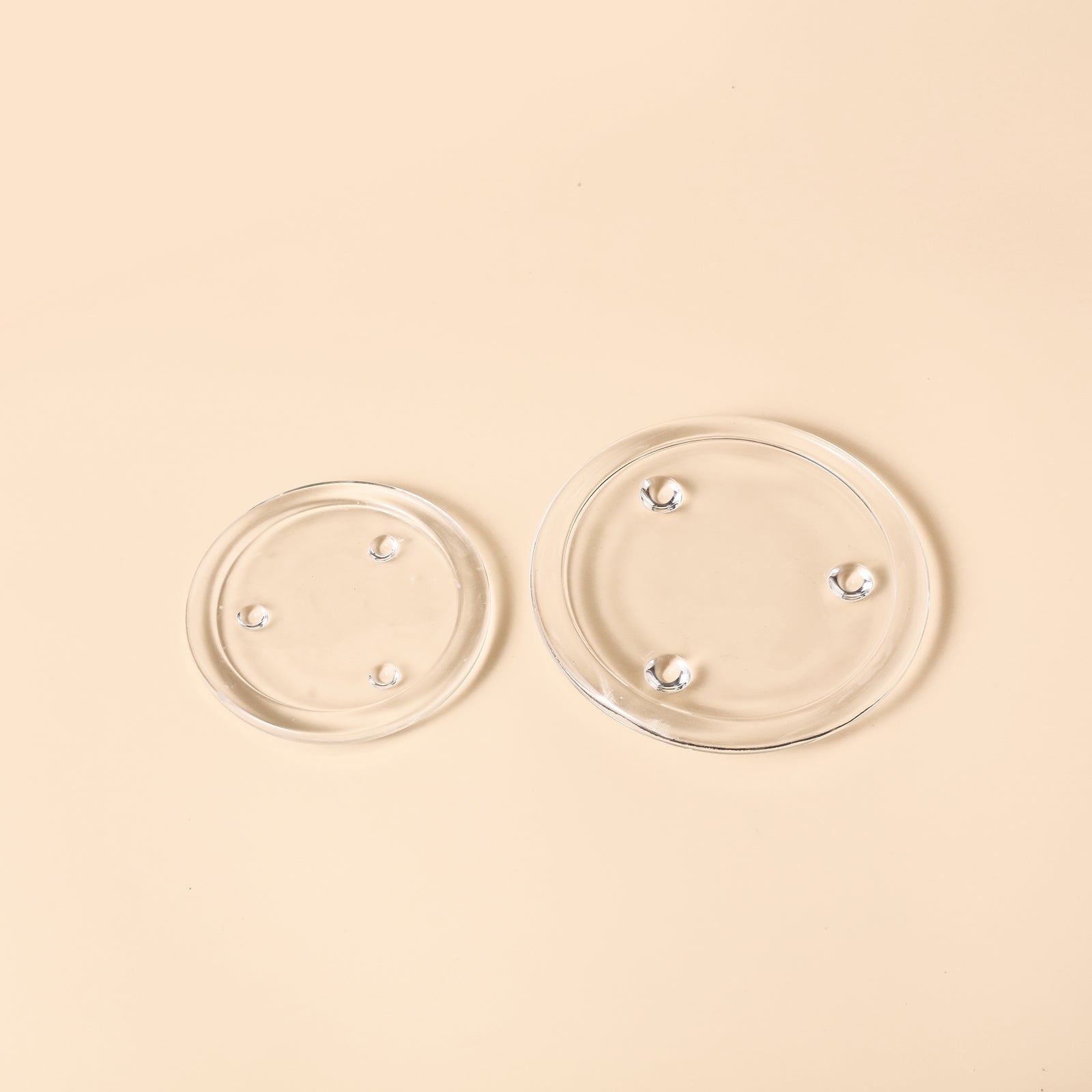 Two glass trays, one large and one small -Boowan Nicole