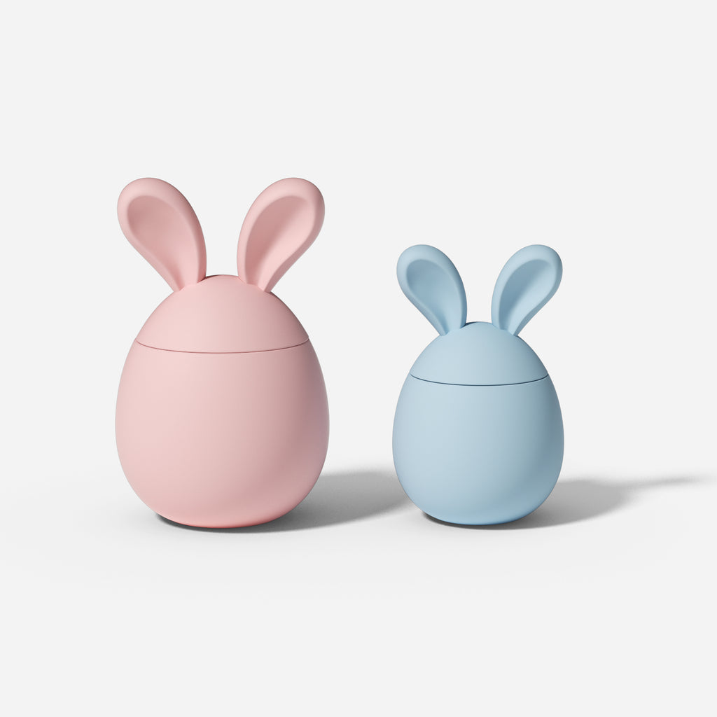 Two Easter bunny candle jars, one large and one small