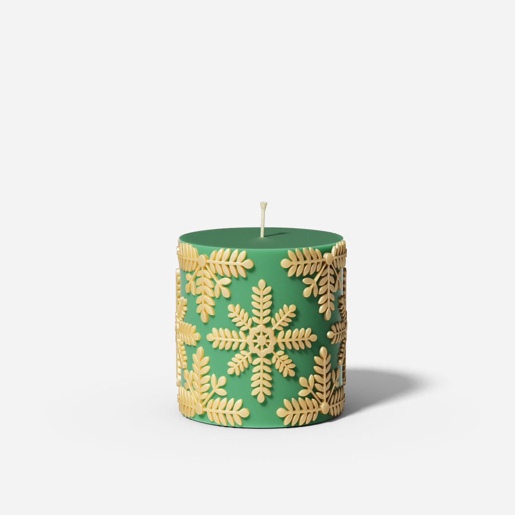 Short green snowflake relief candle made using a silicone mold designed by Boowan Nicole.