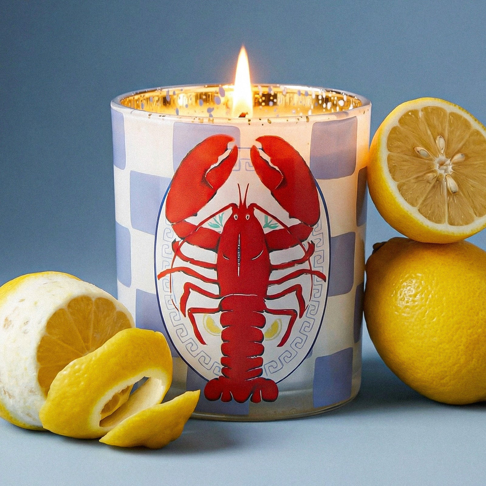 Lit Red Lobster Print Checkered Glass Candle Jar Decorated With Fresh Lemon Slices - Boowan Nicole