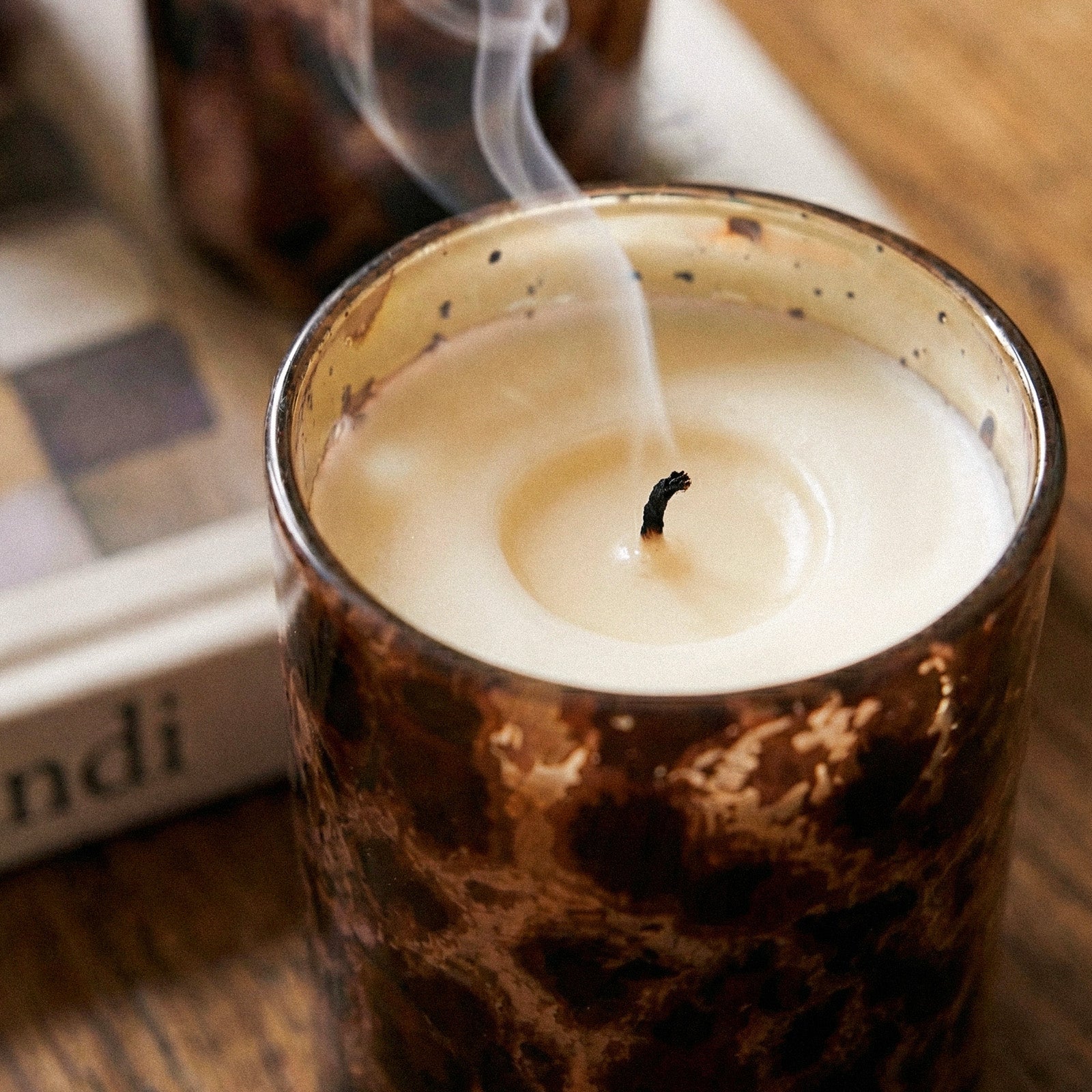 Close-up of Smoldered Wick on Classic Brown Tortoise Shell Graphic Gold Speckled Rim Glass Candle Vessel - Boowan Nicole