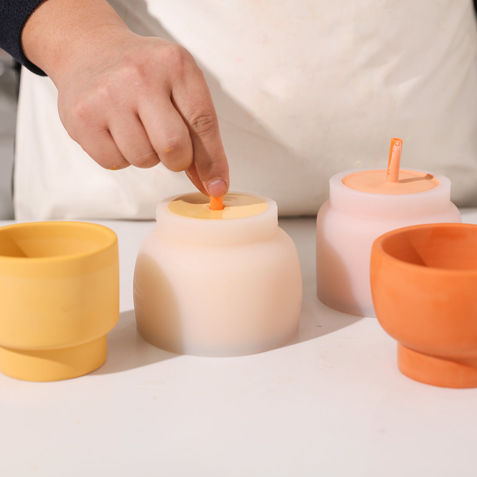 https://boowannicole.com/cdn/shop/files/2creative-silicone-candle-vessels-mold-handmade-concrete-candle-jar-mould-round-succulent-flower-pot-making-tool.jpg?v=1686192089