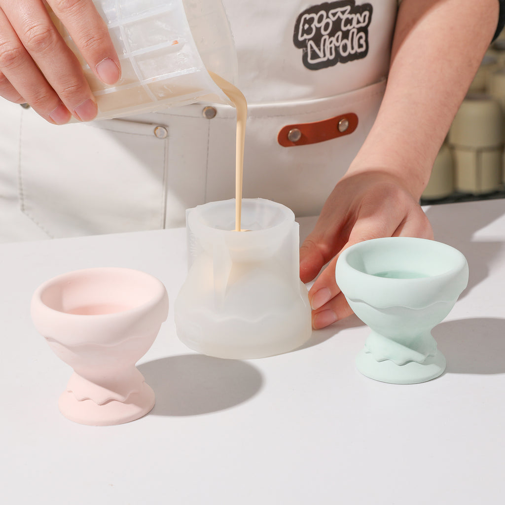 Witness the meticulous process of crafting candle holders using the Eggshell Cup Shape Candle Holder Silicone Mold.