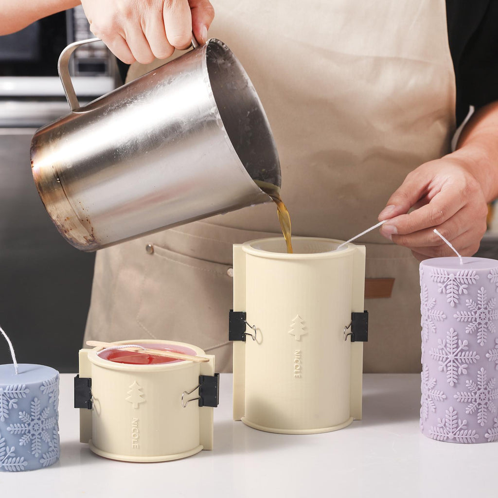 Demonstrating the use of a silicone mold set to create a Christmas snowflake cameo candle.