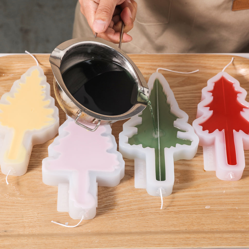 Use silicone molds to create Christmas tree-shaped taper candles.