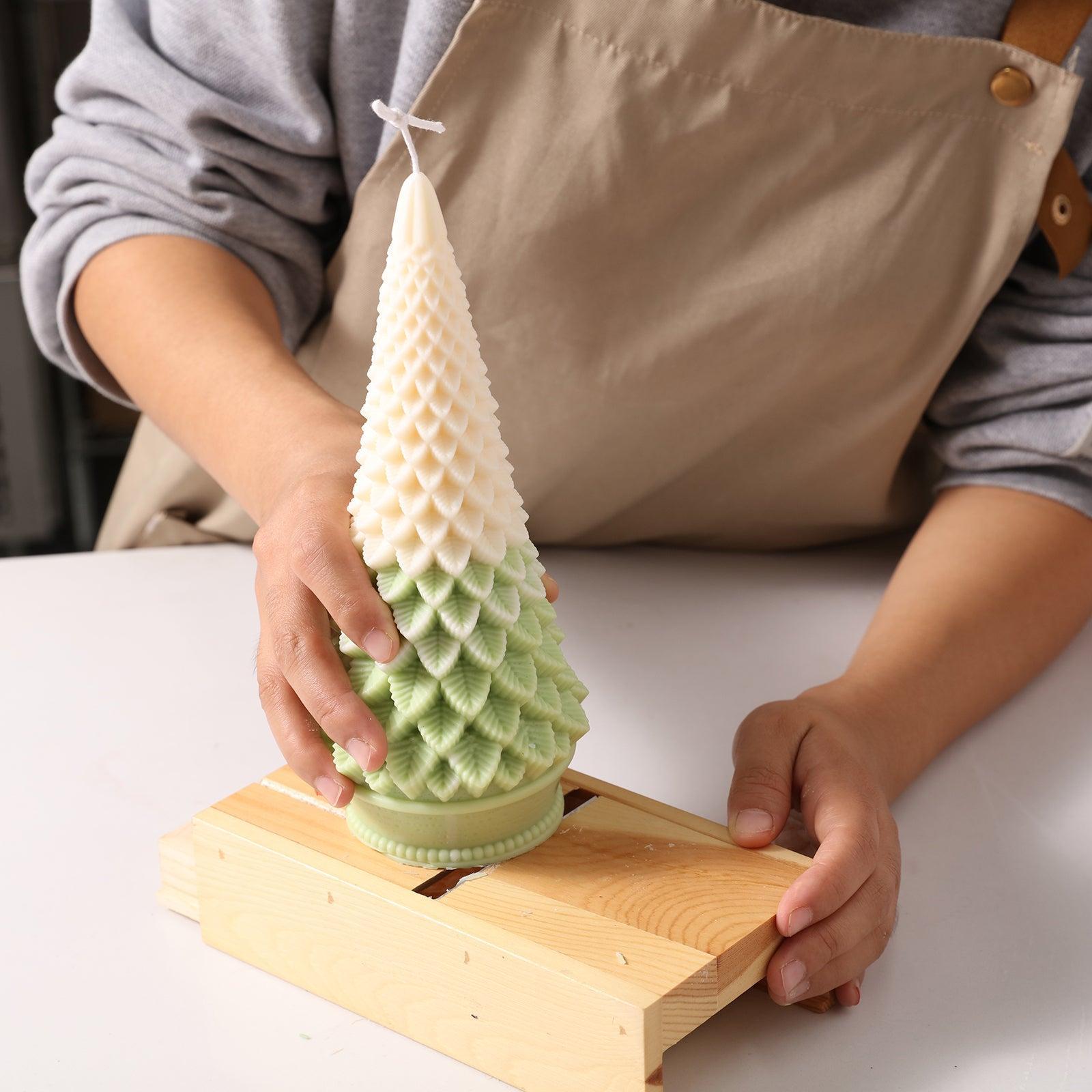 Use a tool to smooth the bottom of your Christmas tree candles - Boowan Nicole