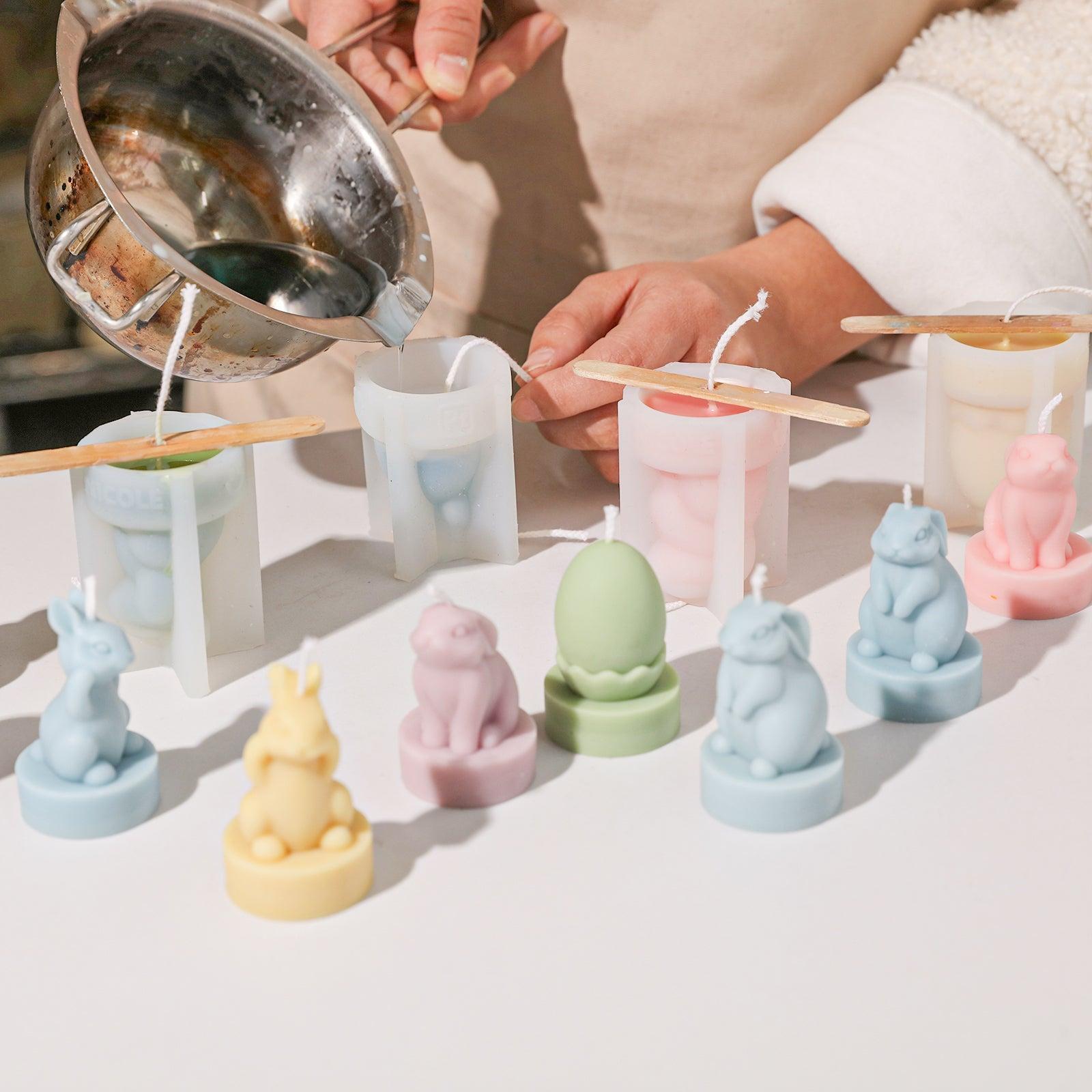 Making Easter bunny tealight candles using a silicone mold.