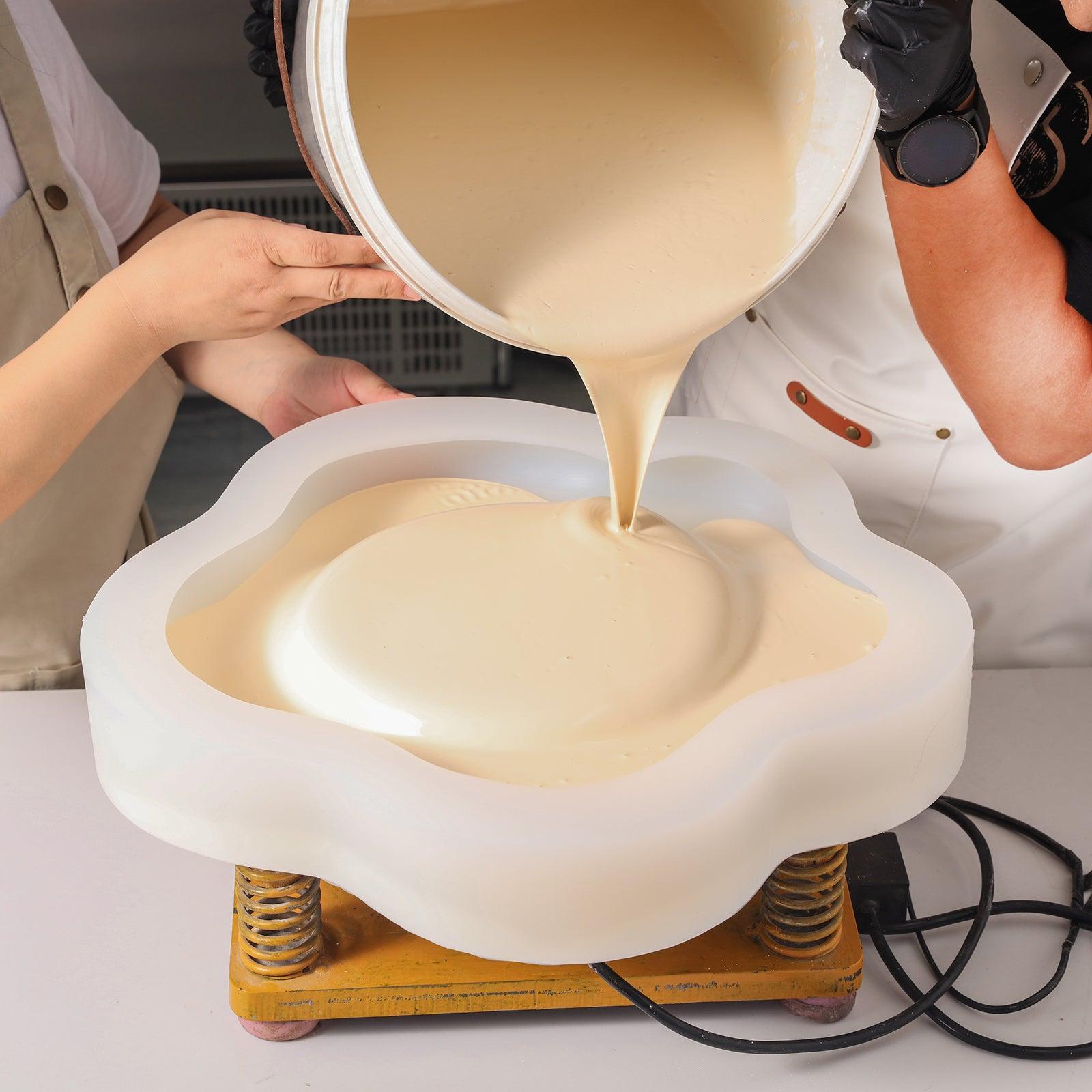 Display of large flower-shaped trays made with silicone molds