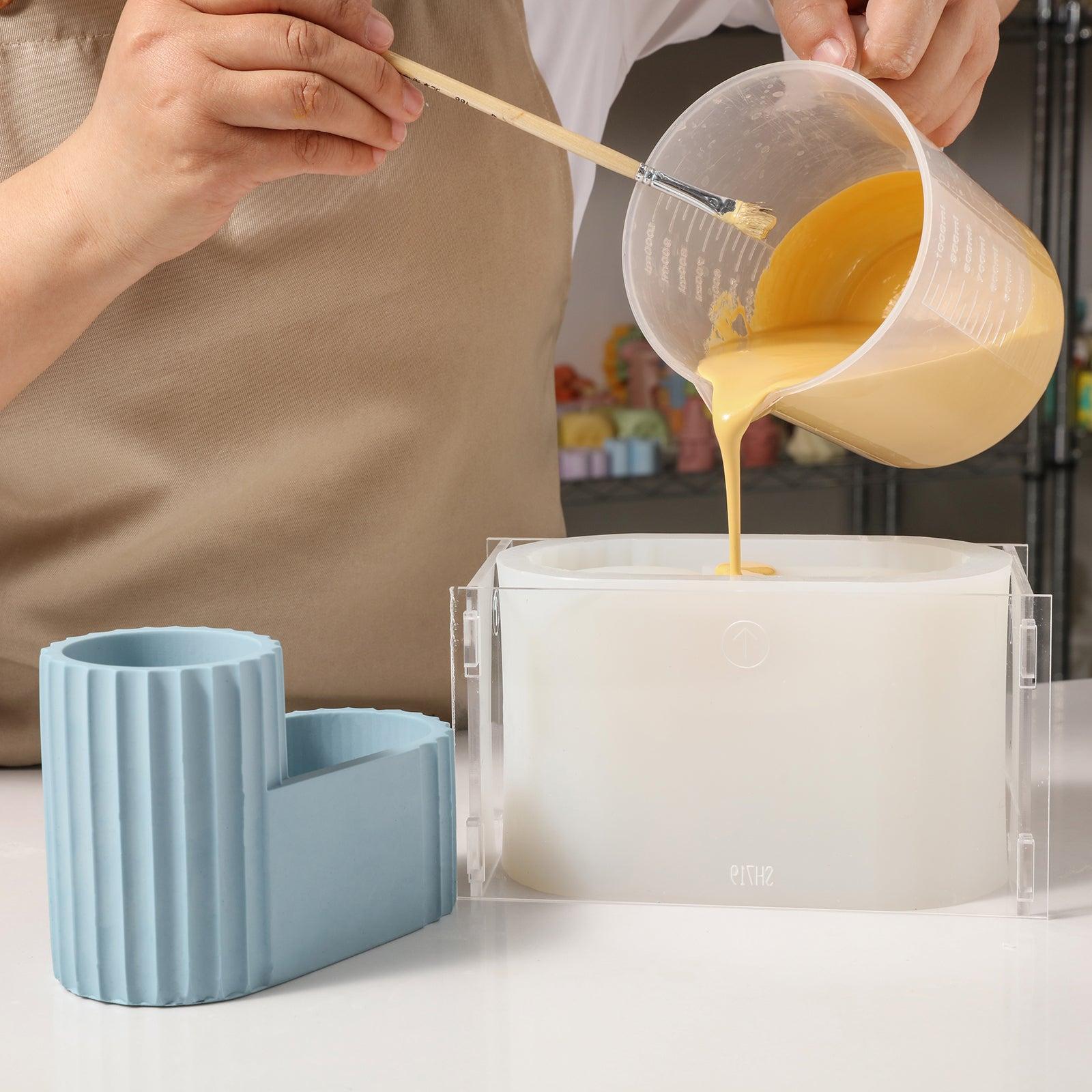 Pour boowannite material into silicone mold to make Tall Pen Holder-Boowan Nicole