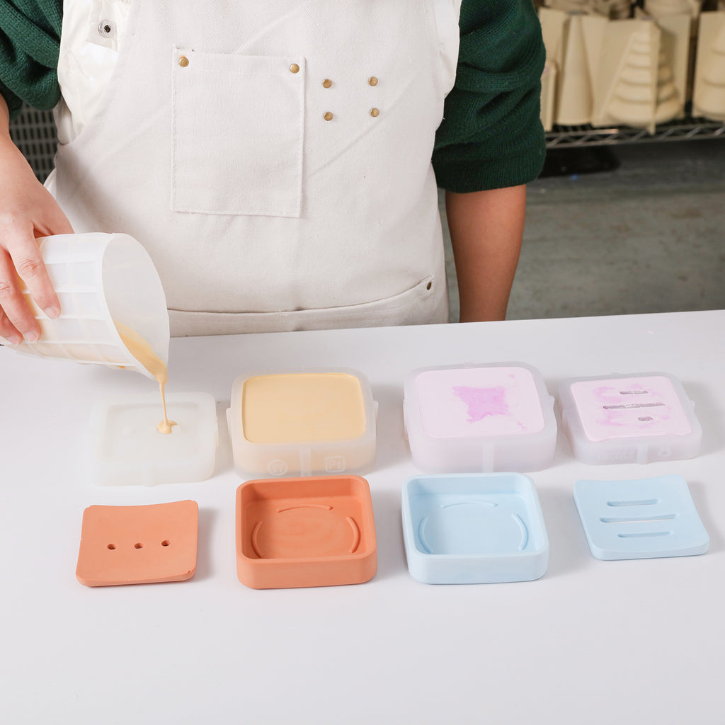 Making soap boxes with silicone molds, showcasing the handmade process.