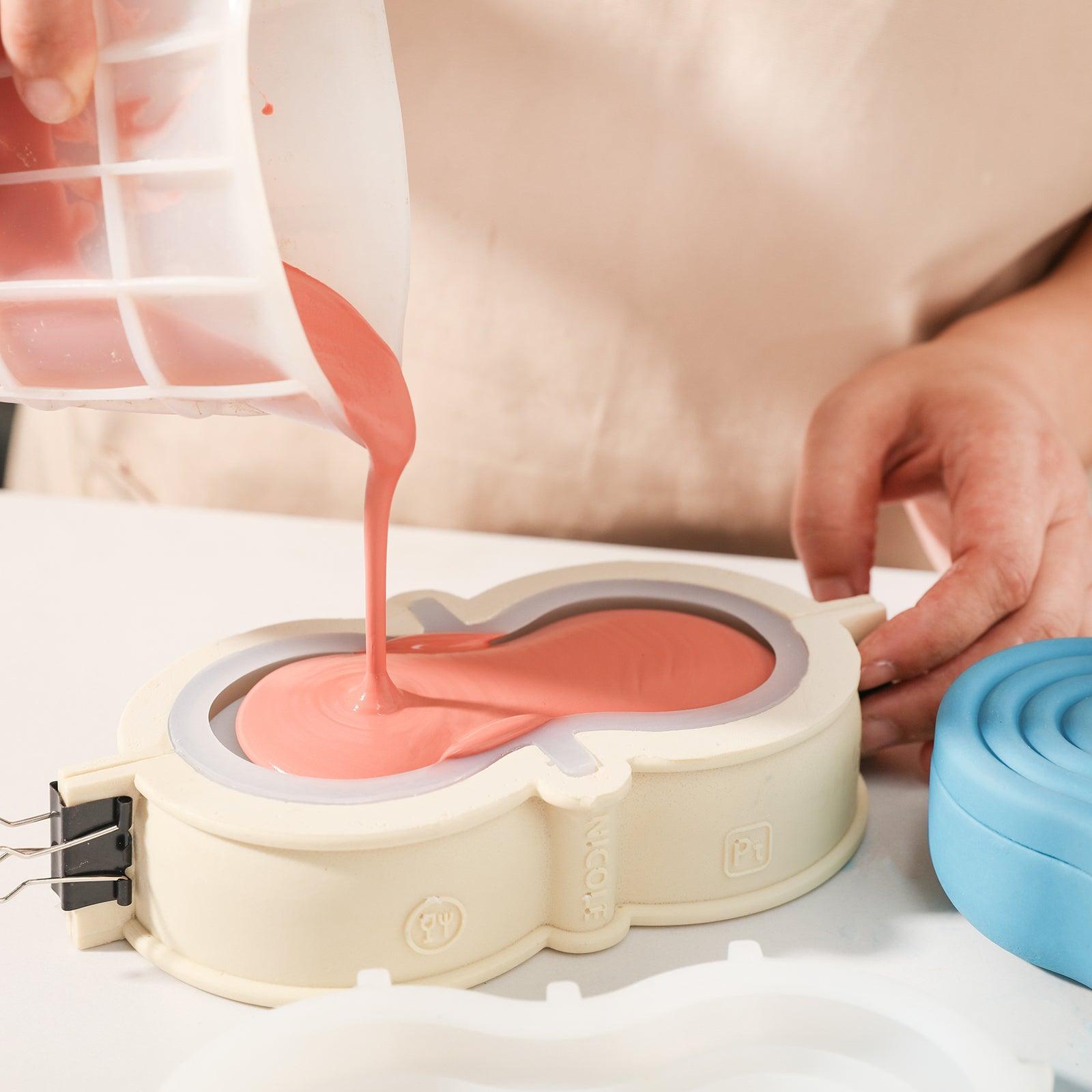 Pour red boowannite material into silicone mold to make Trinket Storage Box-Boowan Nicole