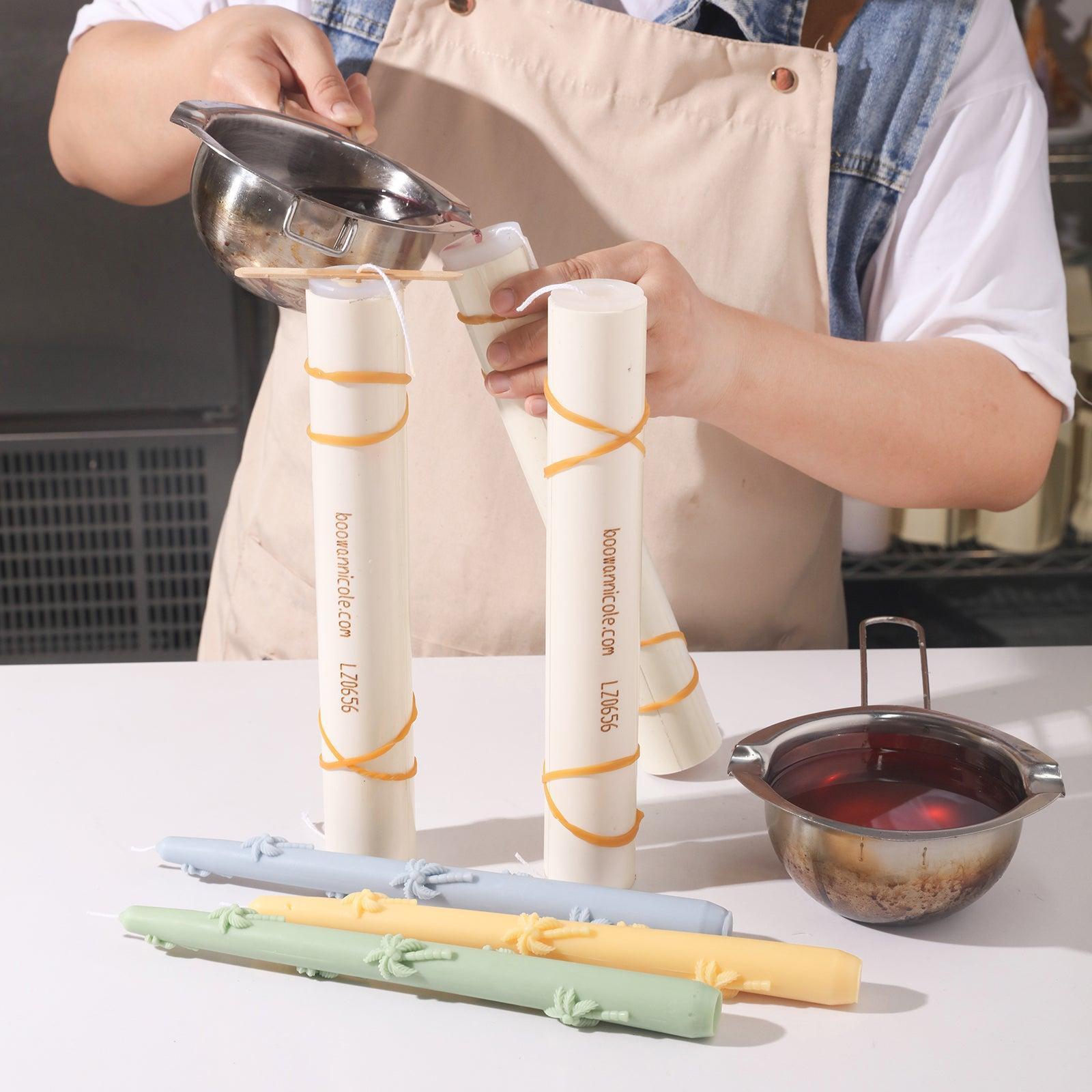 Use a silicone mold to create a palm tree embossed taper candle.