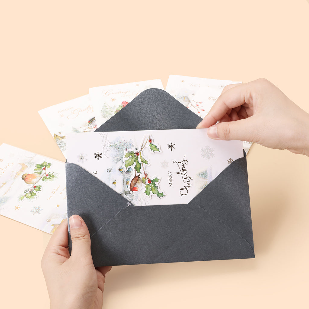 Put greeting cards in envelopes -Boowan Nicole