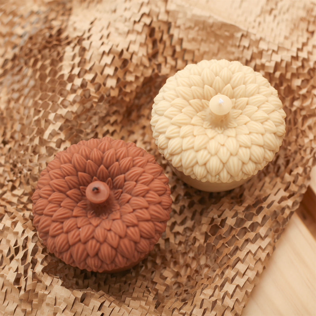 The brown and beige acorn candles made with Boowan Nicole silicone molds showcase intricate detailing