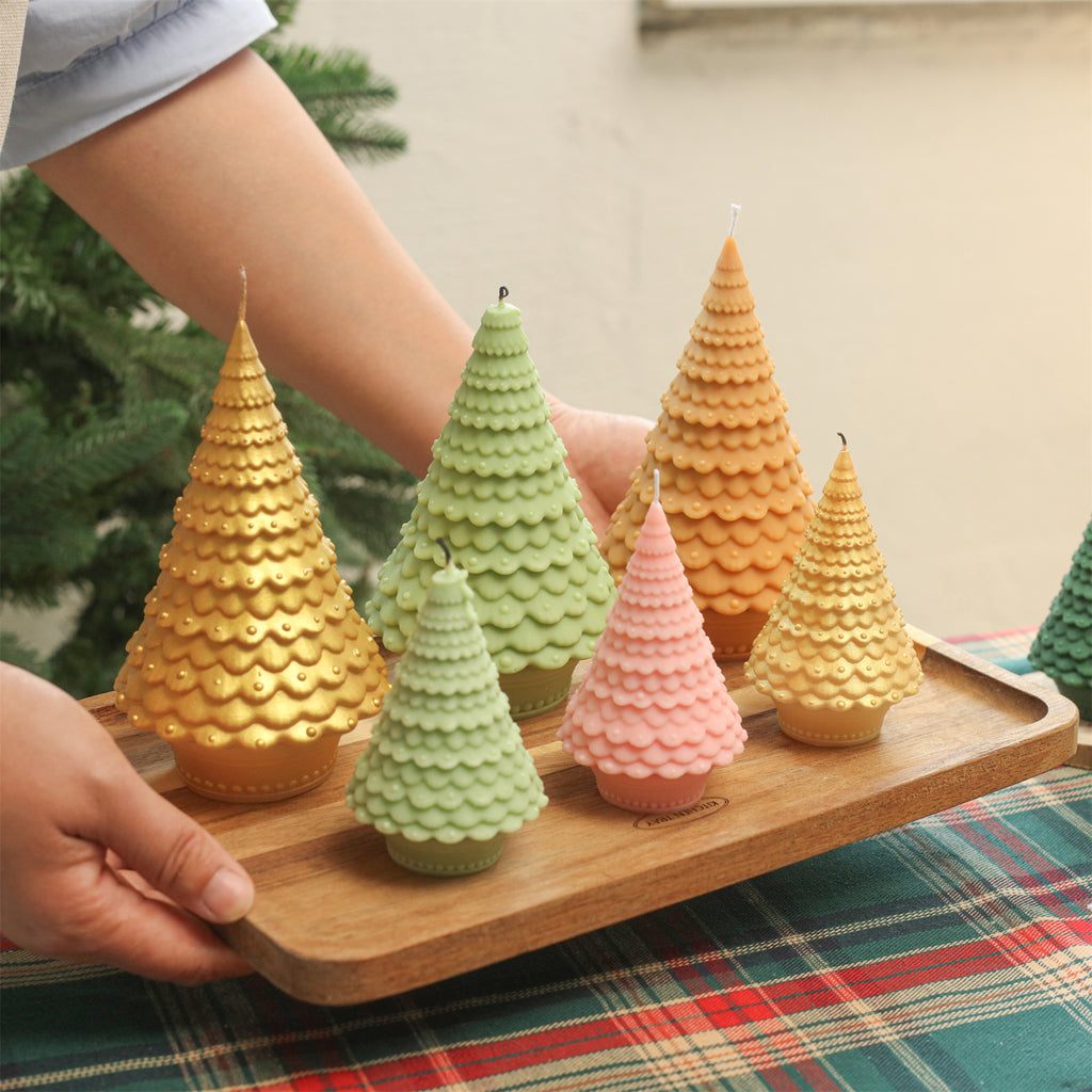 Colorful Christmas tree candles on a wooden tray bring warmth and festive cheer to your holiday decor-Boowan Nicole