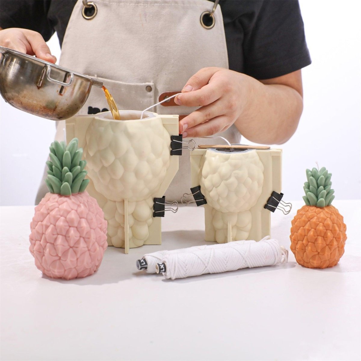 Pour wax into the silicone pineapple candle mold with a removable support shell-Boowan Nicole