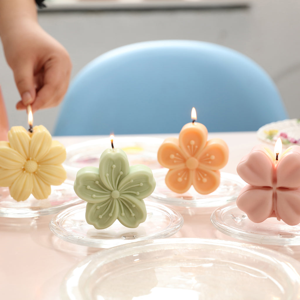 Light the four floral candles in the crystal tray on the table-Boowan Nicole