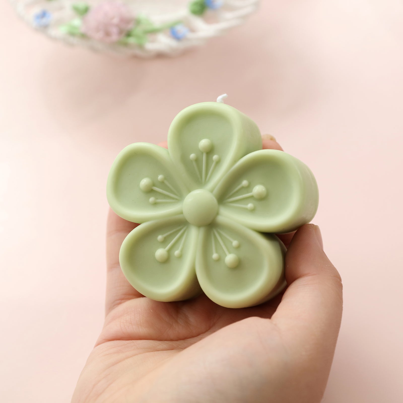 Holding Green Peach Blossom Candle Display-Boowan Nicole