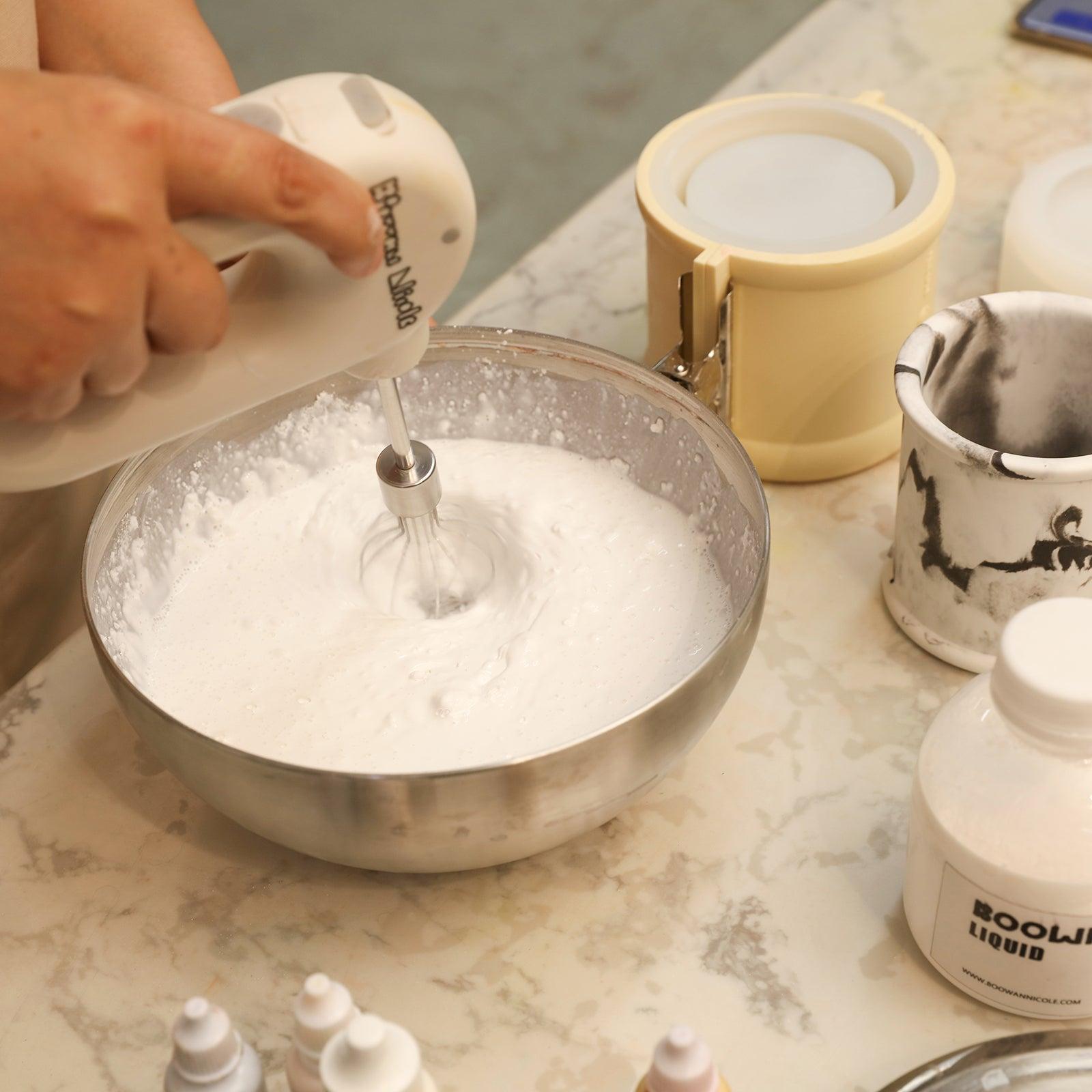 Use an electric mixer to stir the Boowannite ingredients -Boowan Nicole