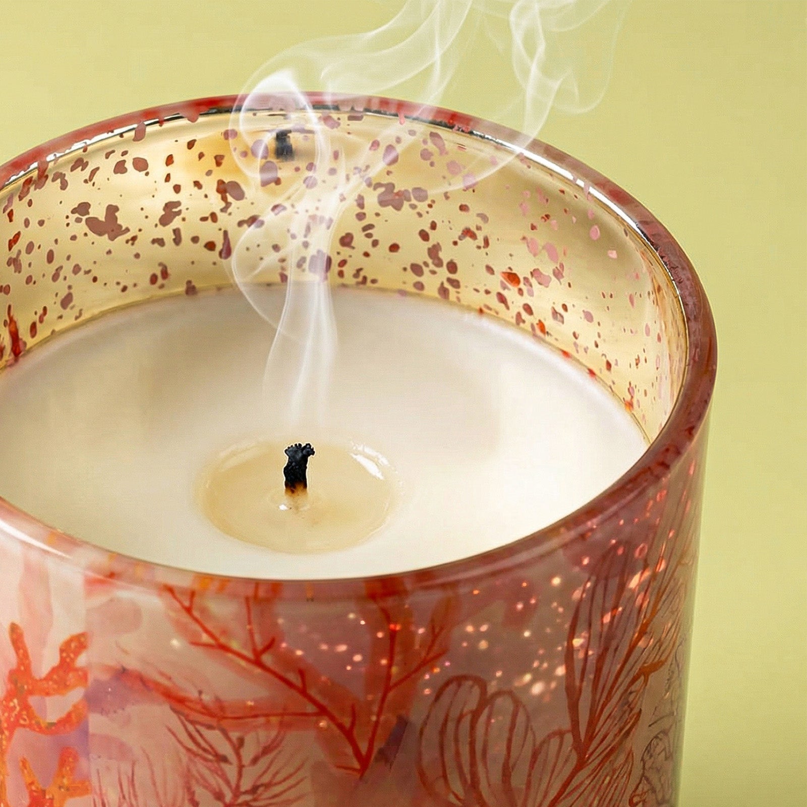 Close-up of Smoldered Wick on Red Ocean Coral Print Gold Speckle Rim Glass Candle Cup - Boowan Nicole
