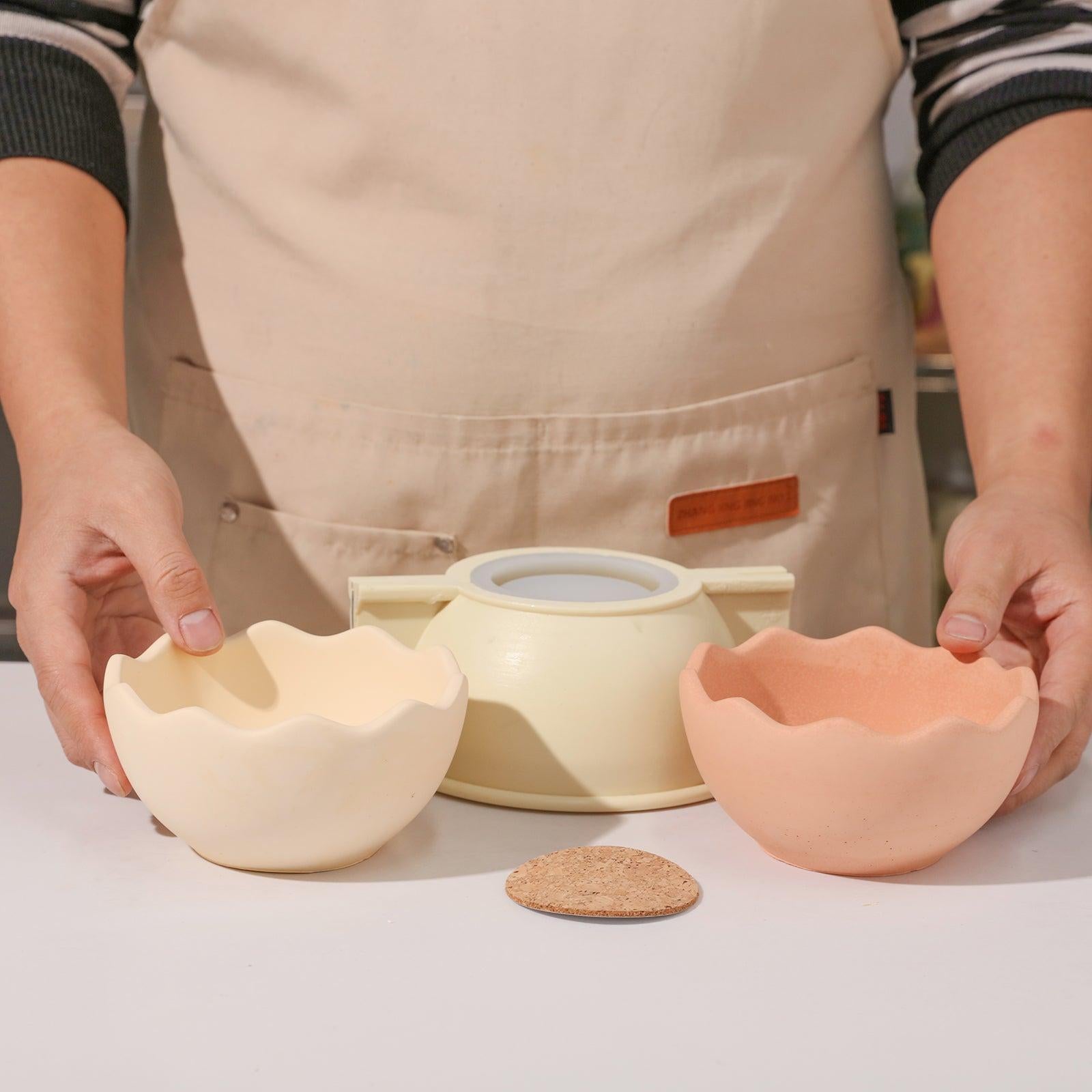 Display of finished eggshell bowls made from molds