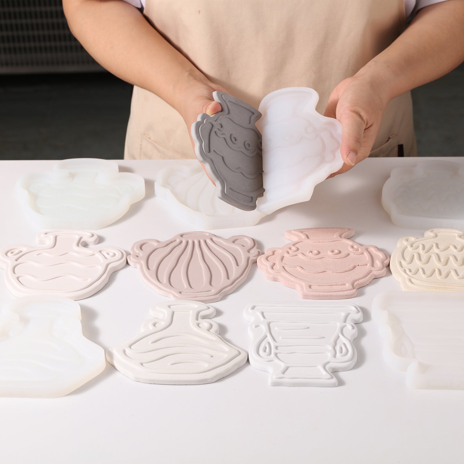 The finished coaster emerges from the silicone mold, designed by Boowan Nicole.