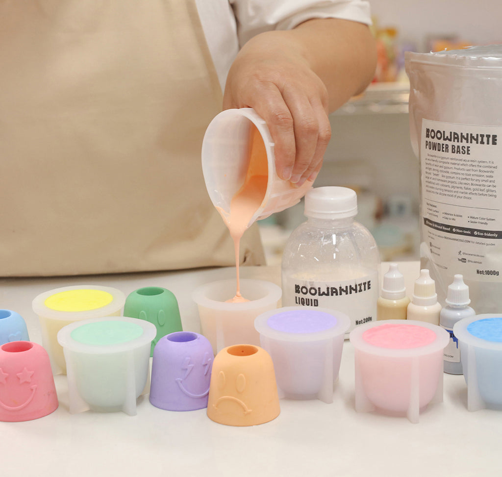 Pour boowannite material into white silicone mold to make Bell-shaped Emotion Pen & Toothbrush, Holder-Boowan Nicole