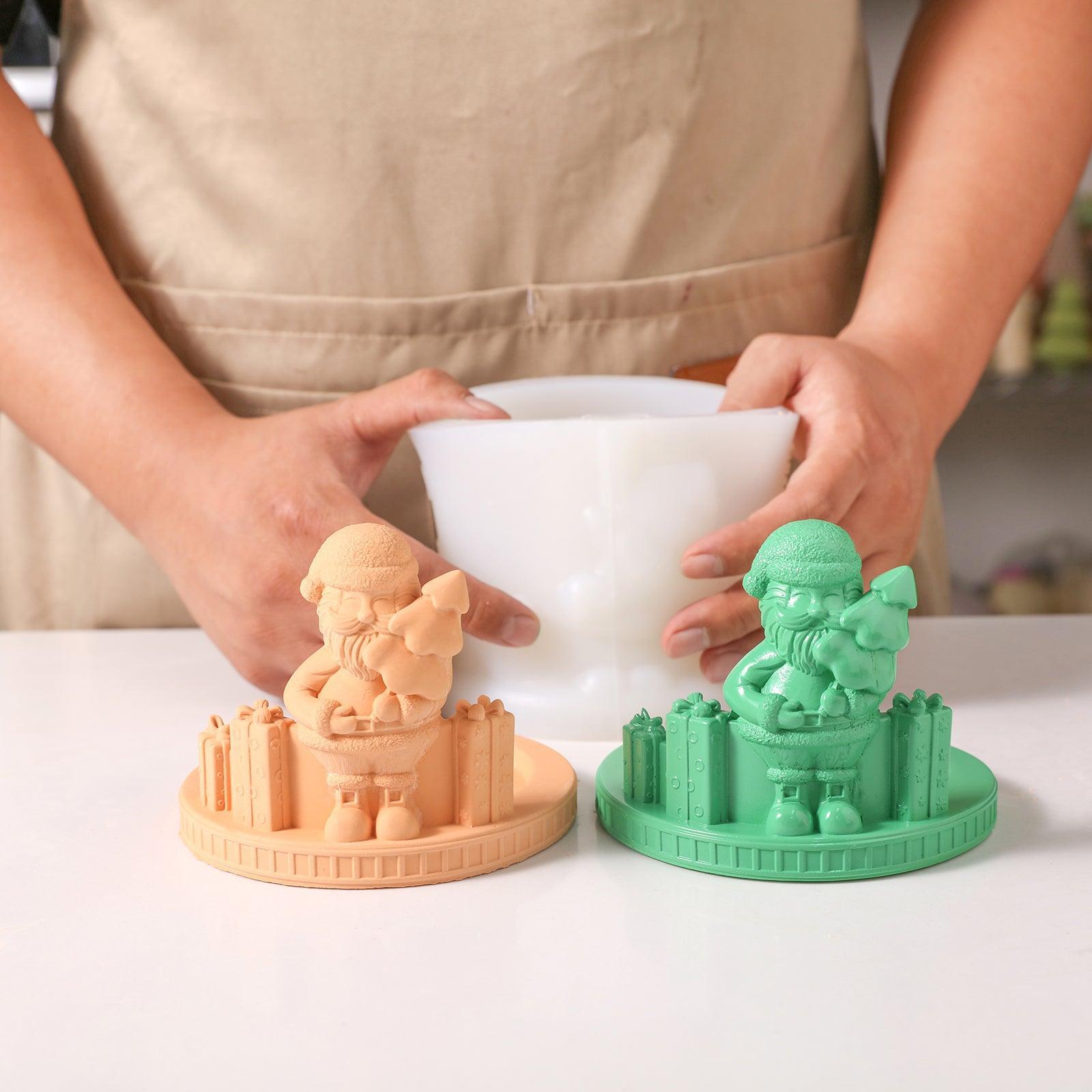 Green and yellow-pink Santa candle holder, designed by Boowan Nicole.