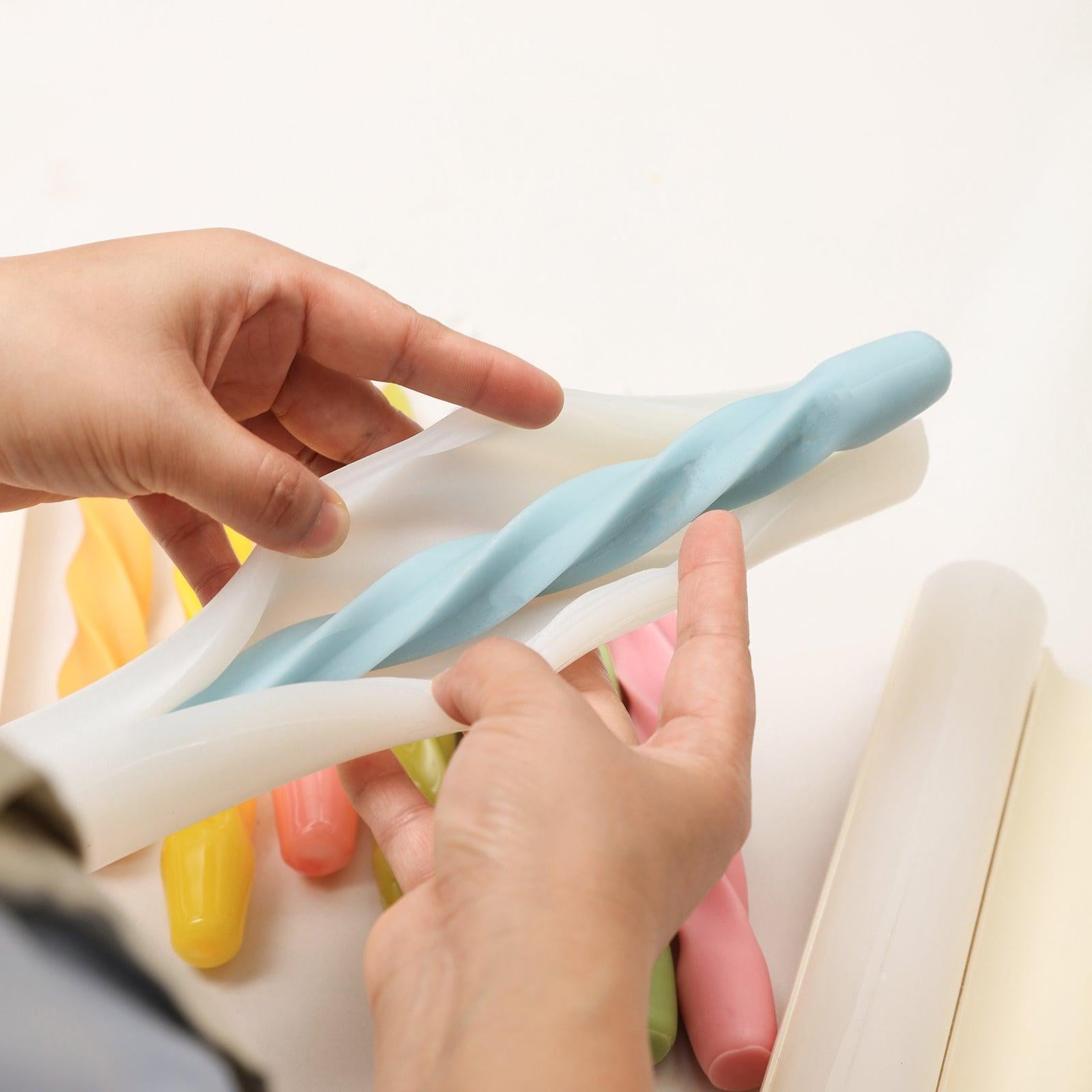 Spiral taper candles crafted with Boowannicole silicone molds gracefully released from the molds