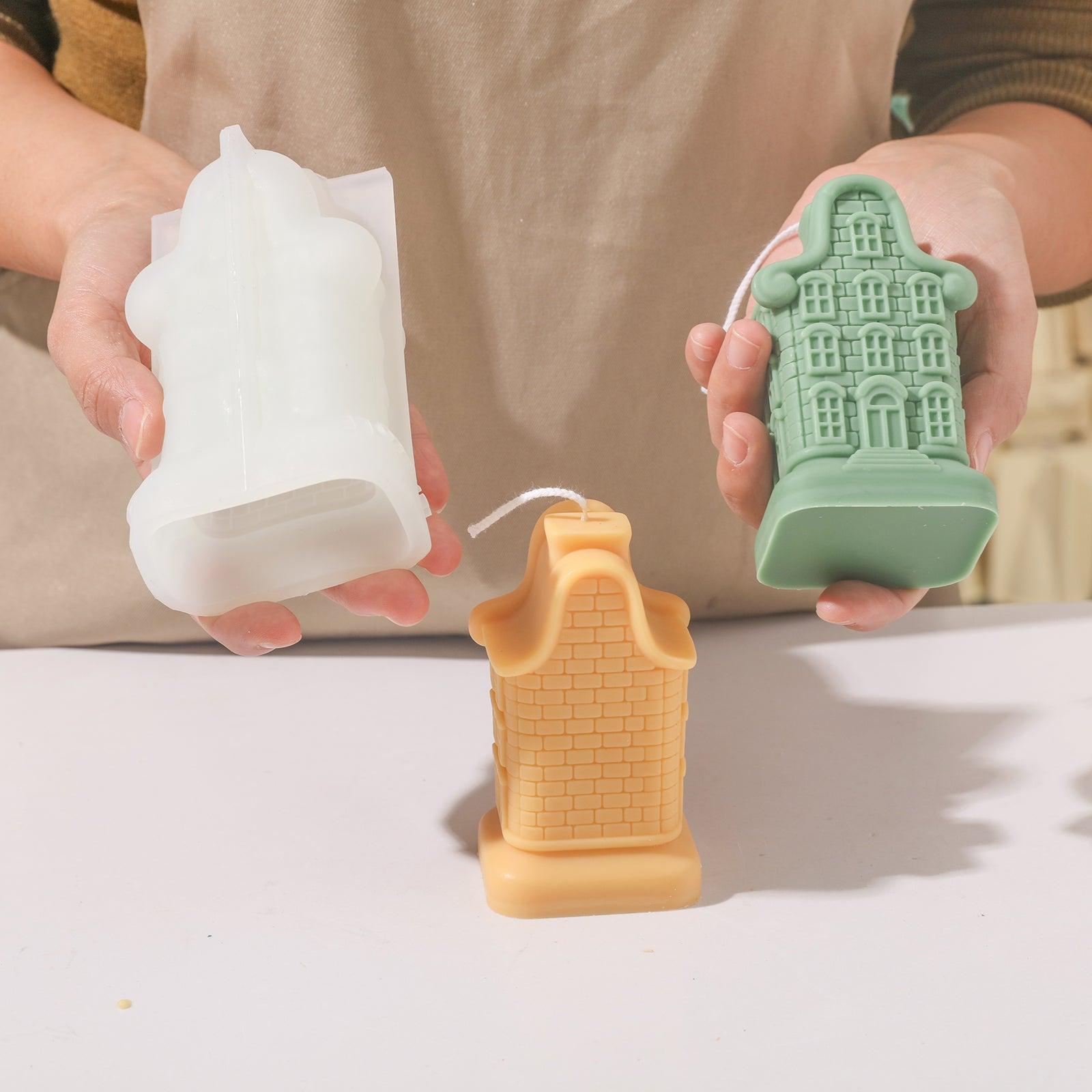 Holding nine windows house candle and silicone mold display.