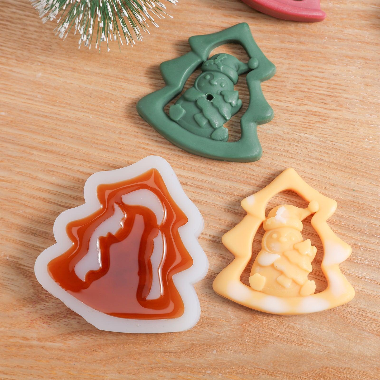 Green, yellow Tree-Hugged Snow Friend Candle Jar Decoration, and candle jar decoration in white mold waiting to solidify-Boowan Nicole